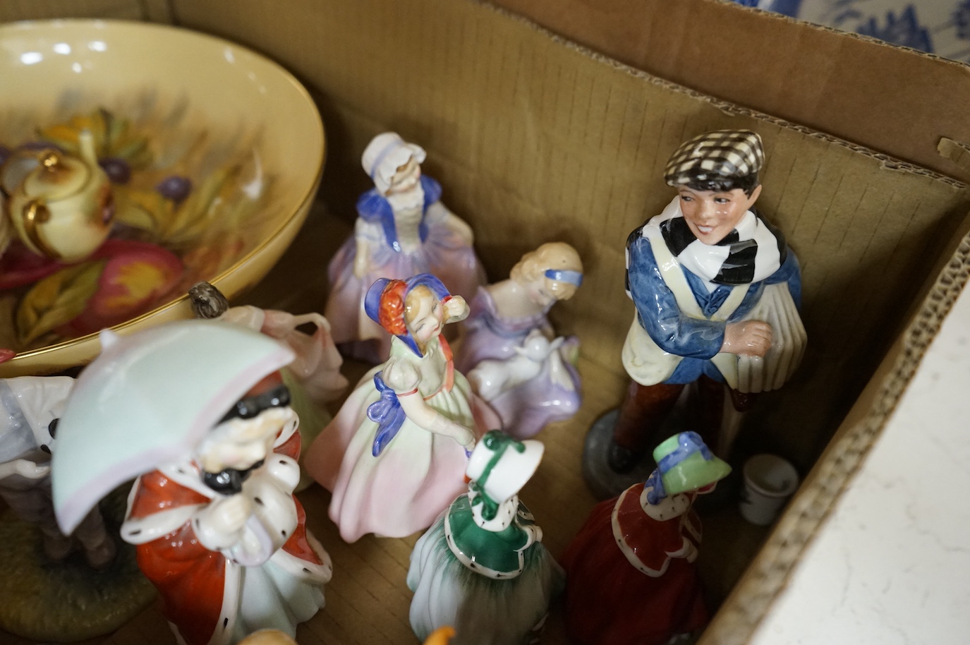 A collection of mixed ceramics to include Doulton figures, set of six Royal Albert old country roses cups and Spode plates